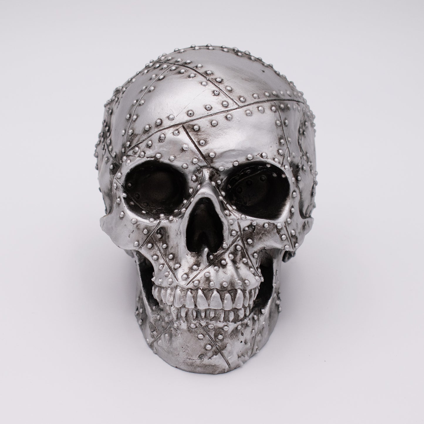 Silver Rivet Skull Sculpture