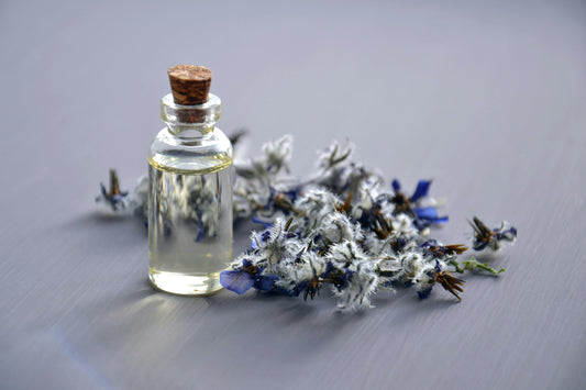  A glass perfume bottle with flowers