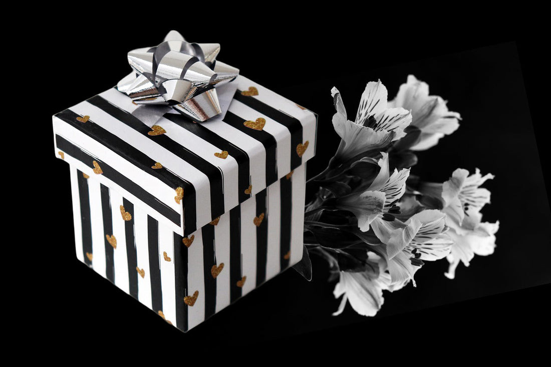 Black and white striped present with flowers. 