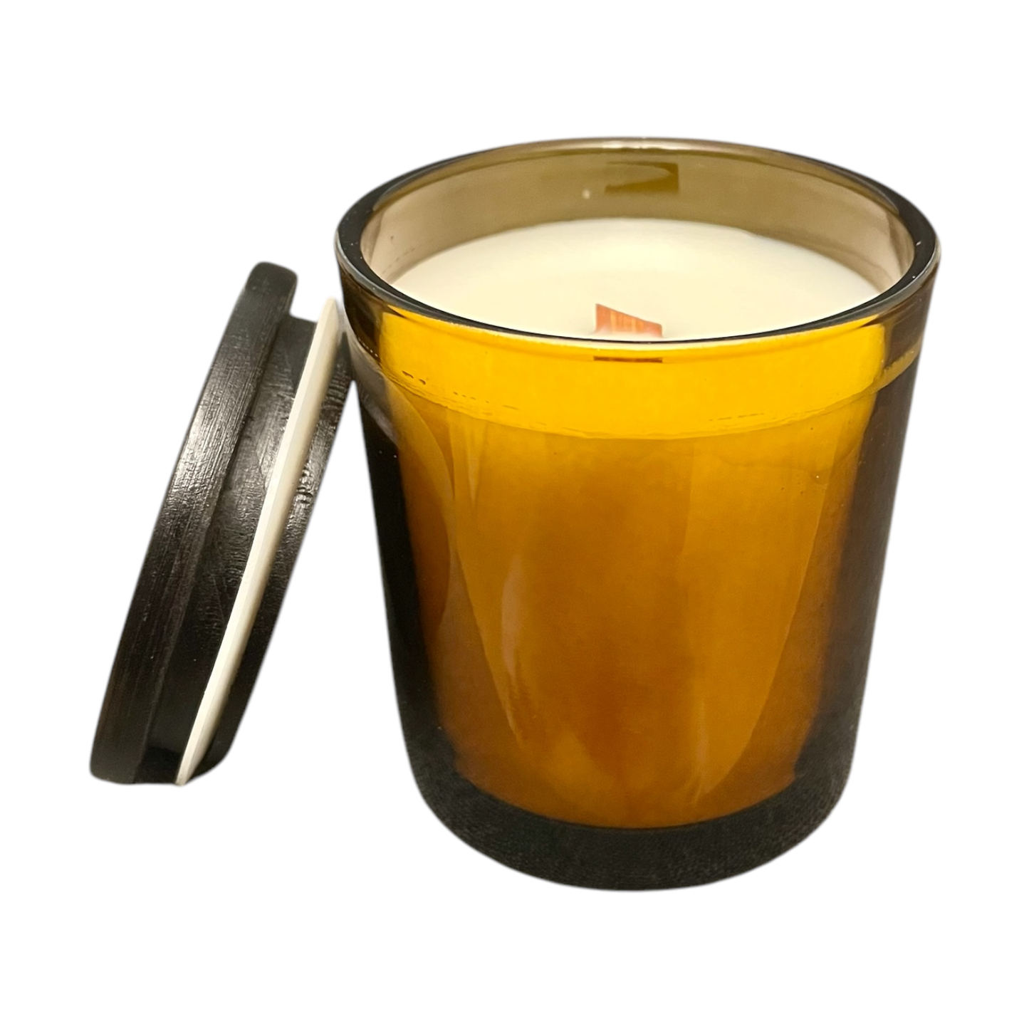 Amber glass candle with a wooden wick on a white background