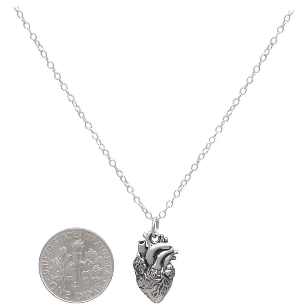 Sterling Silver Anatomical Heart Necklace with dime for scale on white background- Shadowplay Collection Gift Shop