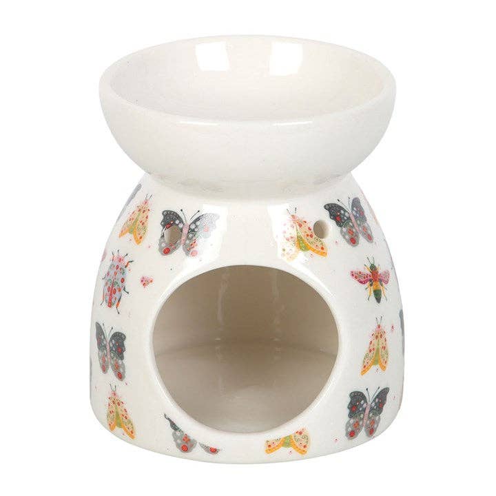 Back view of Ceramic oil burner with insect designs on a white background- Shadowplay Collection Gift Shop