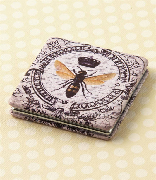 Compact mirror with bee design on a polka dot background- Shadowplay Collection Gift Shop