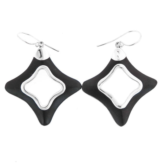 Black and silver geometric earrings on a white background