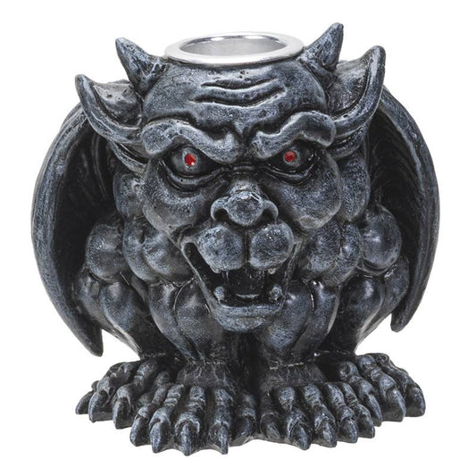 Gargoyle creature Incense Burner with red eyes against a white background