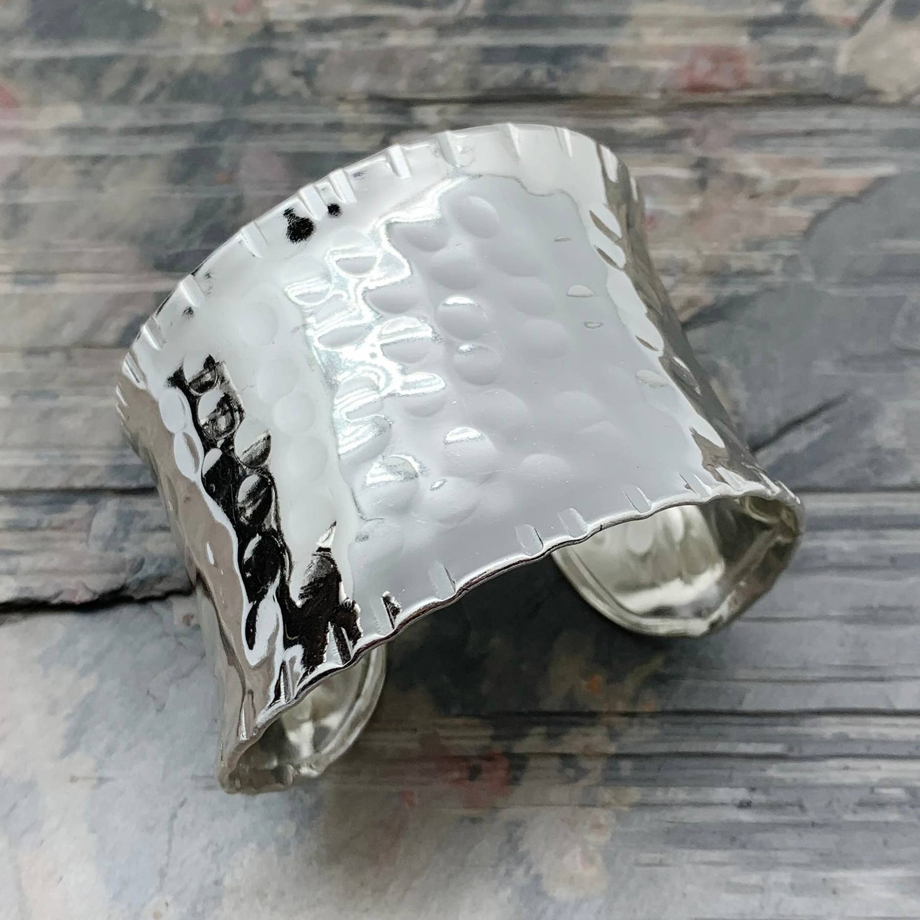 Hammered Silver Plated Cuff Bracelet with wood background- Shadowplay Collection Gift Shop