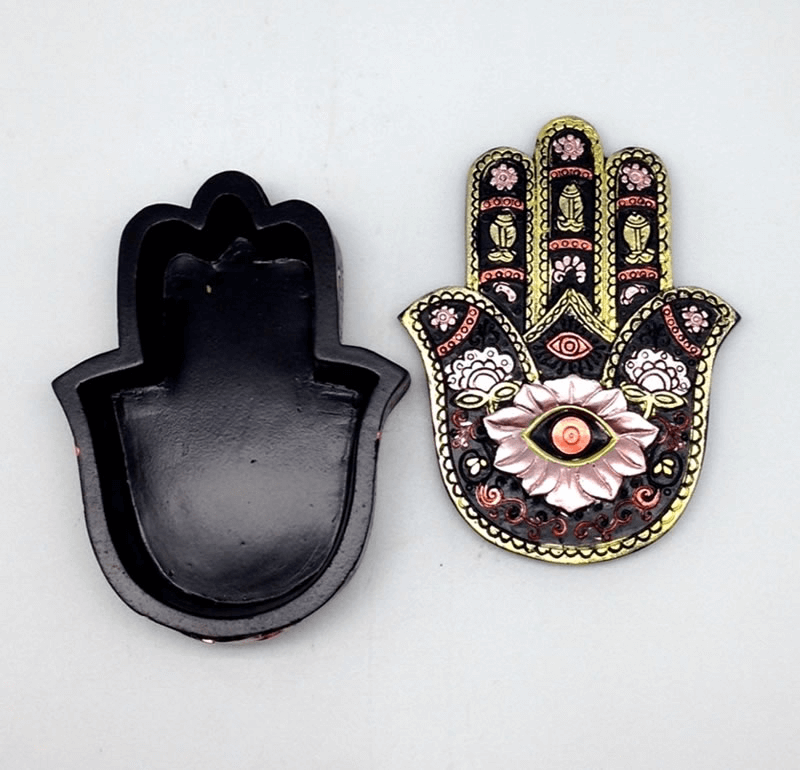 Open Decorative Hamsa hand with intricate designs on a white background