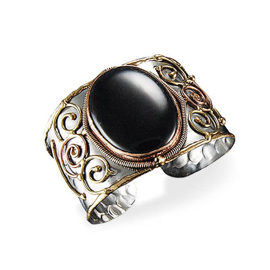 Decorative Cuff Bracelet with black stone and gold and silver detailing on a white background- Shadowplay Collection Gift Shop in San Antonio, TX