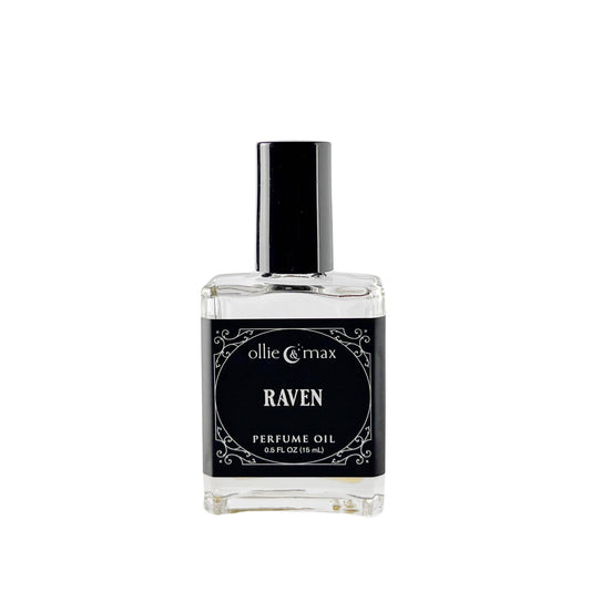 Perfume oil bottle labeled 'Raven' by Ollie Carmax on a white background