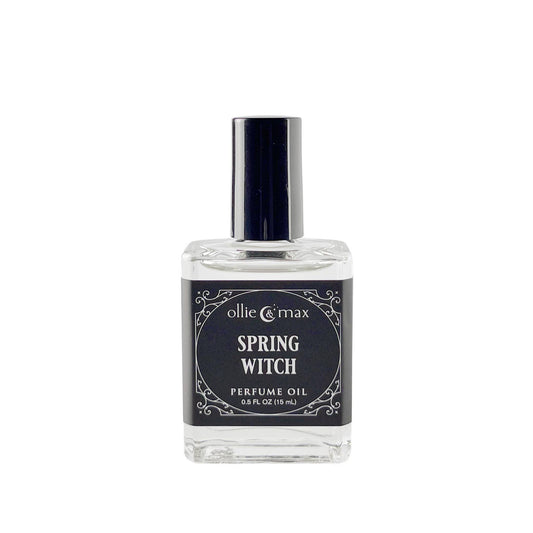 Perfume oil bottle labeled 'Spring Witch' by ollie & max on a white background