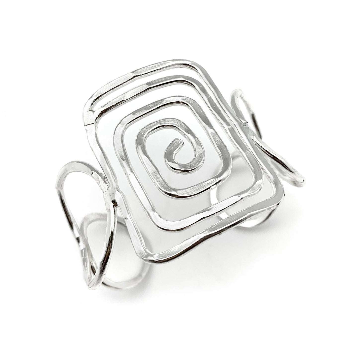 Silver Plated Brass Cuff Bracelet with a geometric design on a white background- Shadowplay Collection Gift Shop in San Antonio, TX