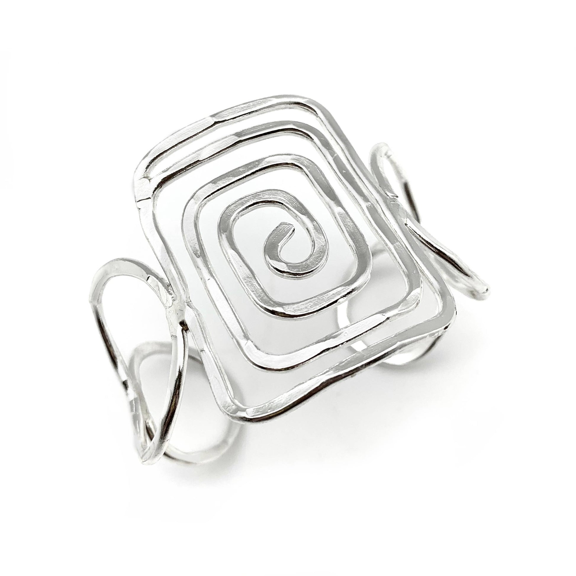 Silver Plated Brass Cuff Bracelet with a geometric design on a white background- Shadowplay Collection Gift Shop in San Antonio, TX