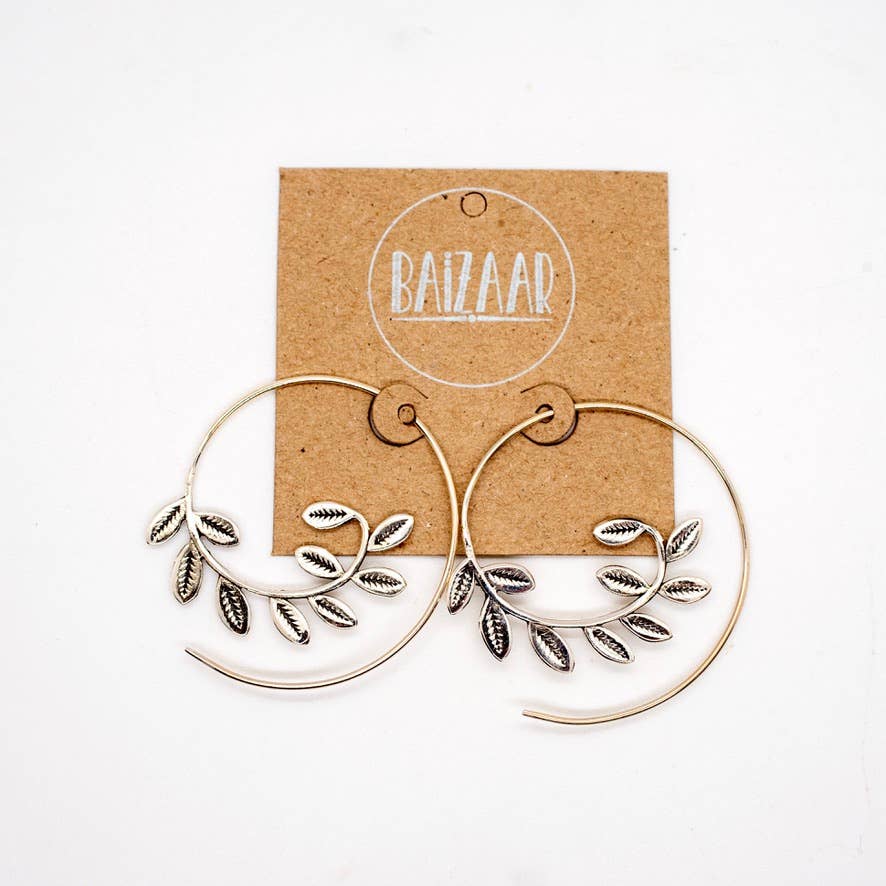 Silver hoop earrings with leaf details on a branded card against a white background-Shadowplay Collection Gift Shop