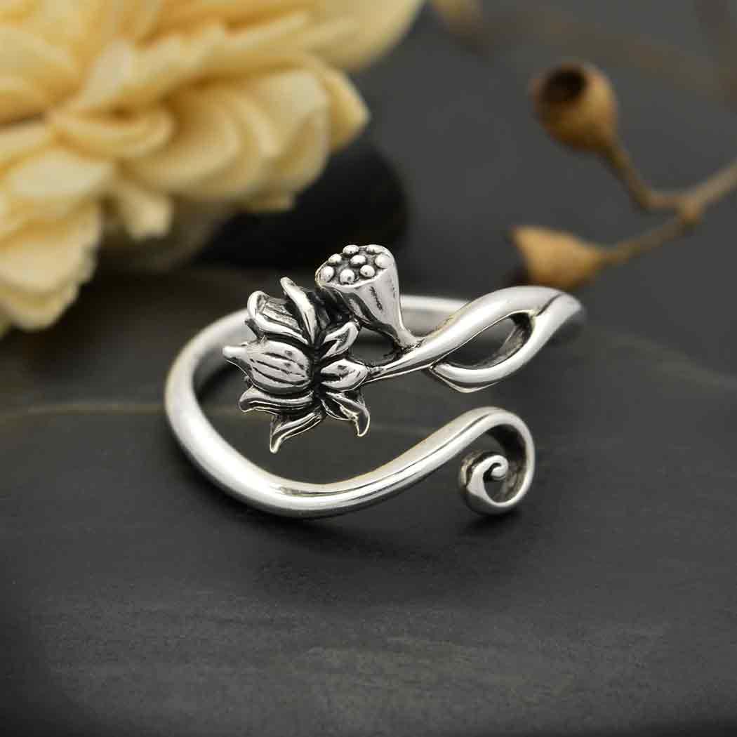 Sterling Silver Adjustable Lotus Ring  with a dark background- Shadowplay Collection Gift Shop