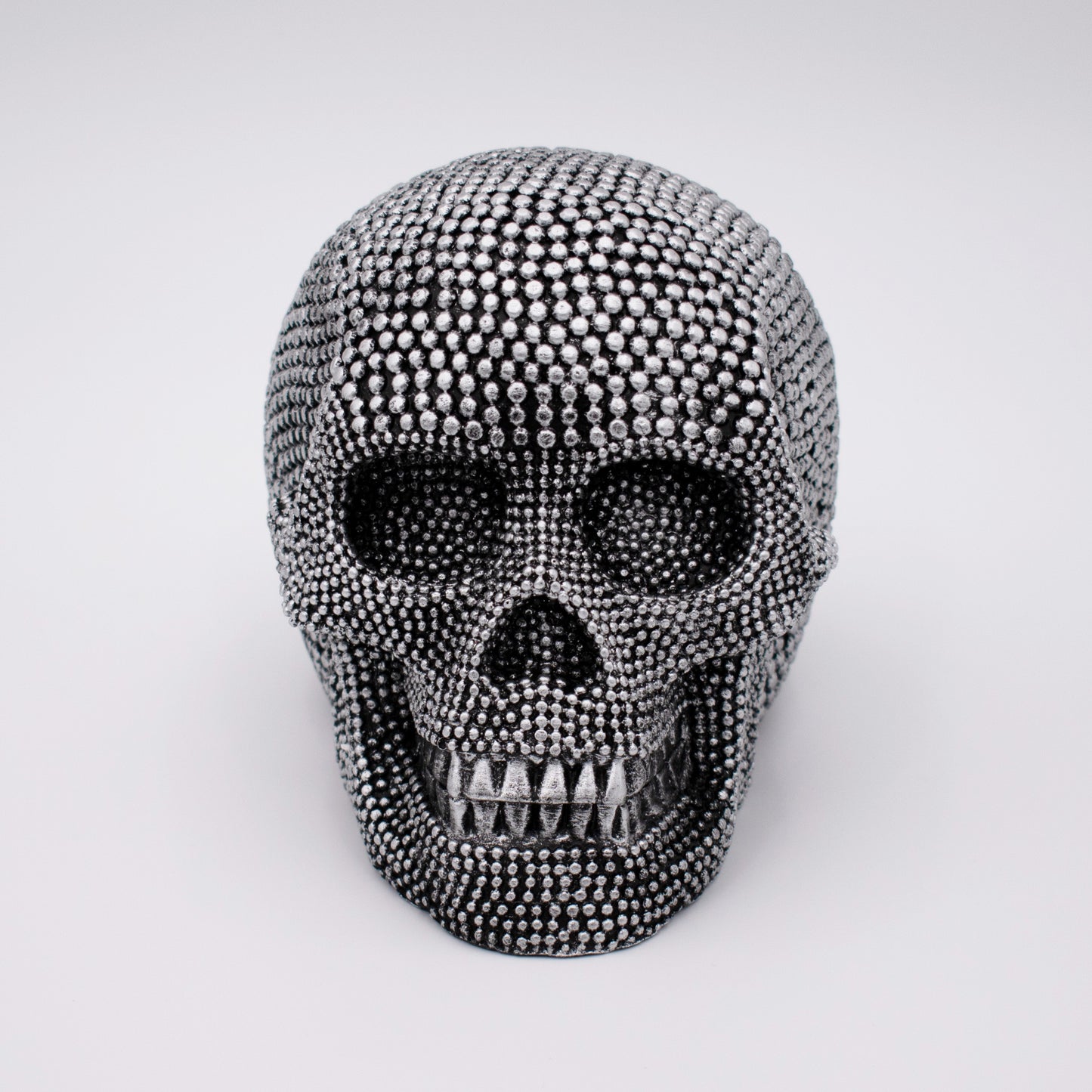 Silver Studded Skull Sculpture