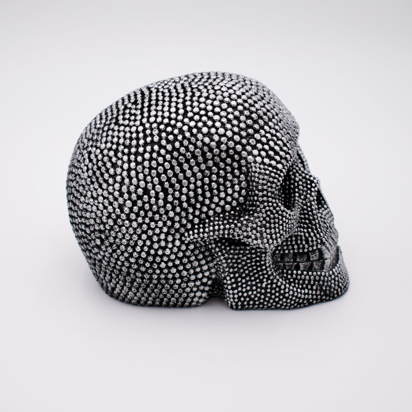 Silver Studded Skull Sculpture